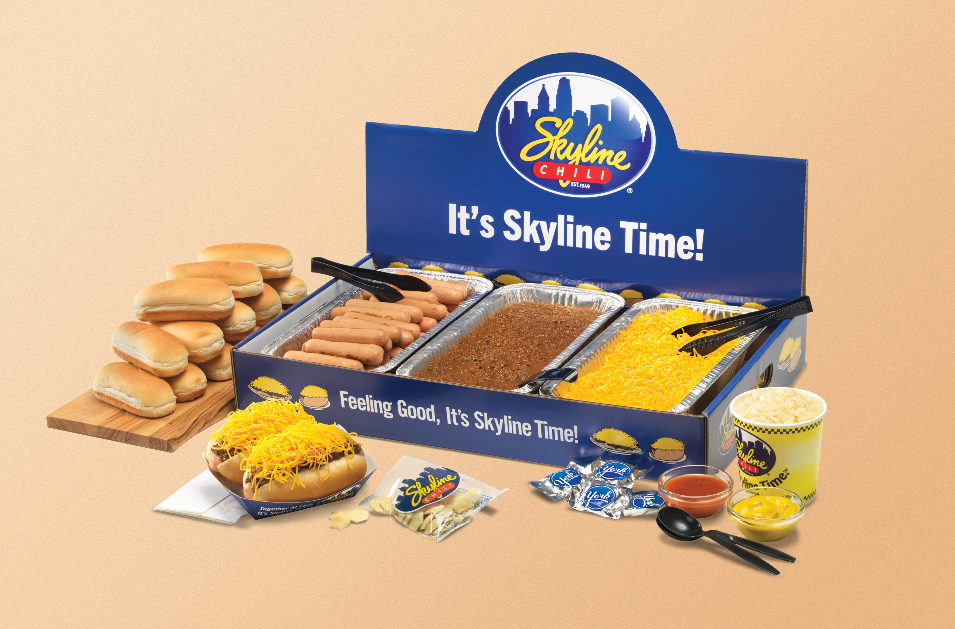 Skyline Coney Kit, featuring a box that holds chili, cheese, and hot dogs, plus buns, crackers, York peppermint patties and condiments