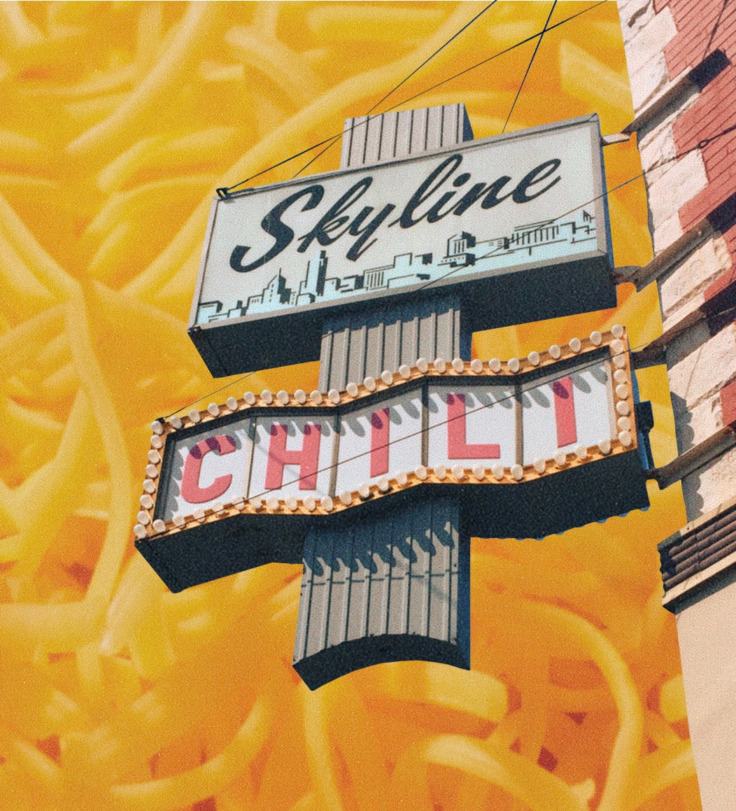 Clifton Skyline Chili sign, upward angle, with a background of shredded cheese